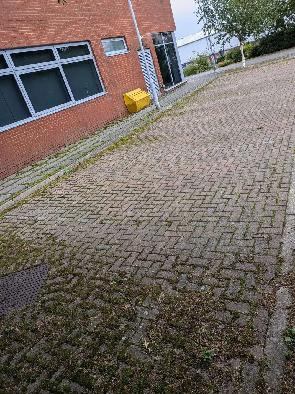 Office unit exterior dirty and weathered before cleaning