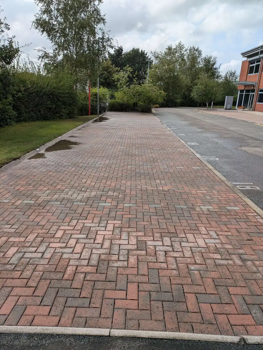 The same business forecourt after pressure washing