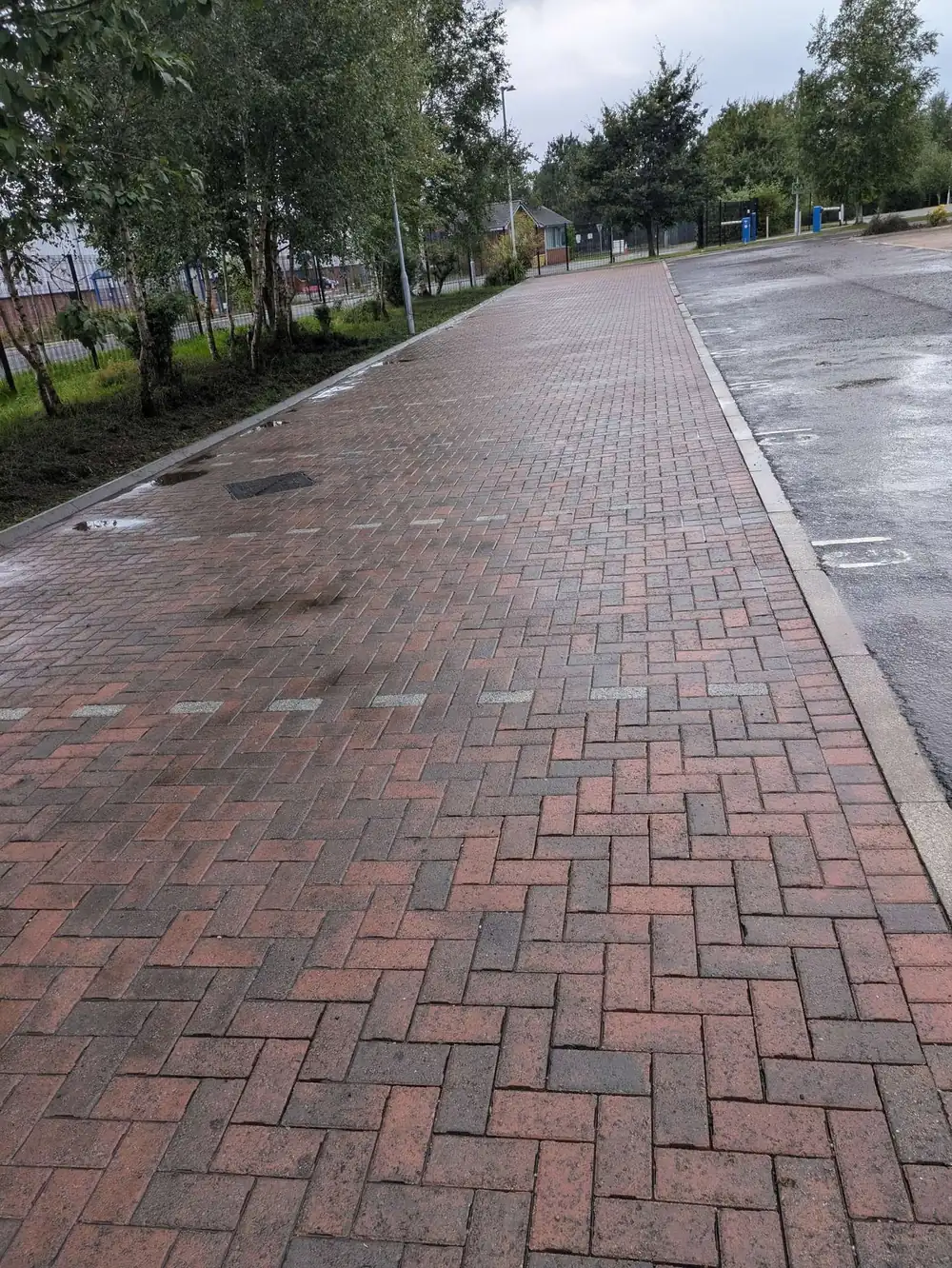 The same kerbs and hard standing after pressure washing